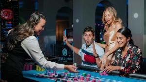 Three people play roulette