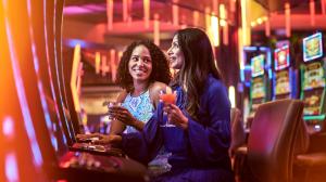 Two women playing games at Wind Creek Wetumpka