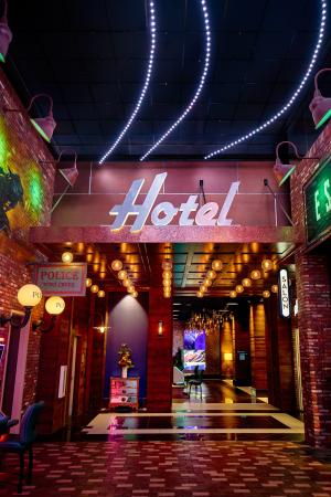 A view of the hallway and Hotel sign at Wind Creek Montgomery