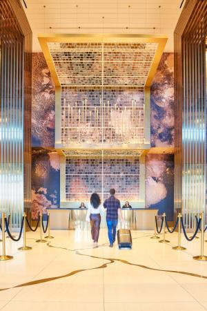 A couple walking into the hotel lobby